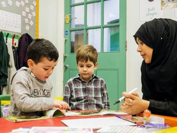 Stock image of youngsters learning through play.