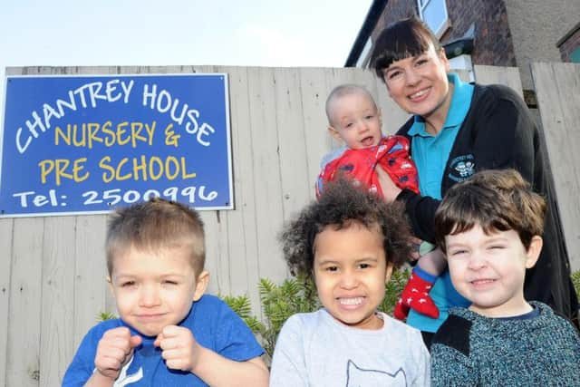 Manager Louise Broadhead celebrates with children