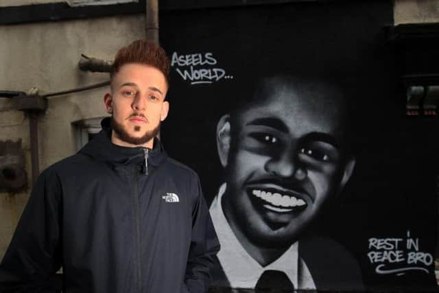 Ben Gourvenec has made a mural to honour the victim of the Upperthorpe shooting on Daniel Hill. Picture: Chris Etchells