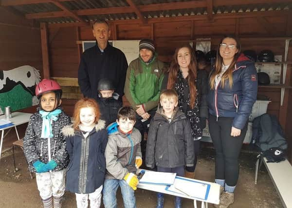 Wilson Field with children at Whirlow Hall Farm