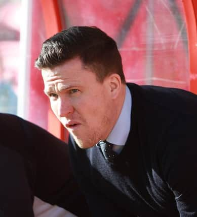 Picture by Gareth Williams/AHPIX.com. Football, Sky Bet League One; 
Swindon Town v Chesterfield; 04/03/2017 KO 3.00pm;  
County Ground; copyright picture;Howard Roe/AHPIX.com
Spirites boss Gary Caldwell in the dug-out at Swindon