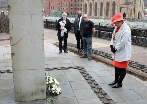 The Lord Mayor and olthers at the wreath laying ceremony at the flood memorial, Sheffield, United Kingdom, 11th March 2017. Photo by Glenn Ashley.