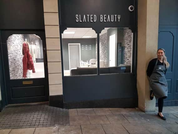 Stacey Buckley outside the salon.