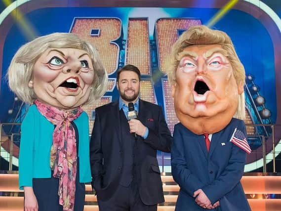 Comic Jason Manford with Bigheads contestants dressed as Theresa May and Donald Trump. (Photo: ITV).