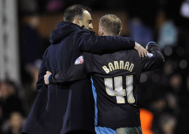 Owls head coach Carlos Carvalhal with Barry Bannan