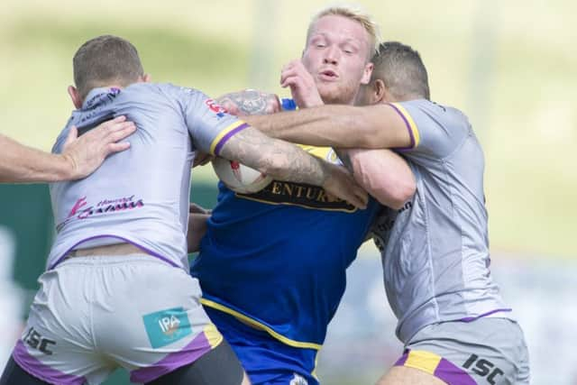 Doncaster RLFC v Newcastle Thunder
Kingstone Press League One
Dons Jamie Thackray is tackled