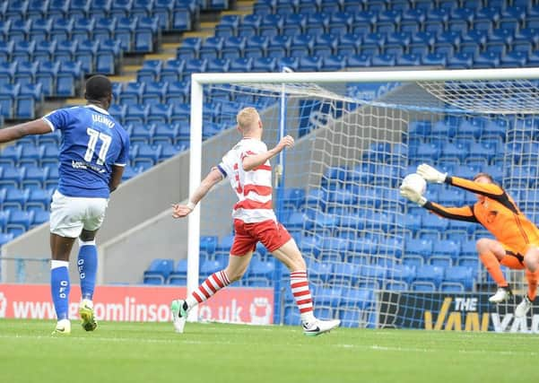 Gozie Ugwu scores against Doncaster Rovers