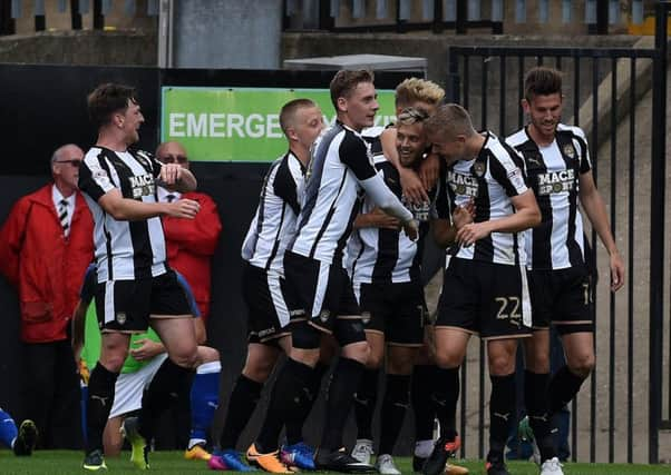 Picture Andrew Roe/AHPIX LTD, Football, EFL Sky Bet League One, Notts County v Chesterfield Town, Meadow Lane, 12/18/17, K.O 3pm

County's players celebrate Jorge Grant's goal

Andrew Roe>>>>>>>07826527594