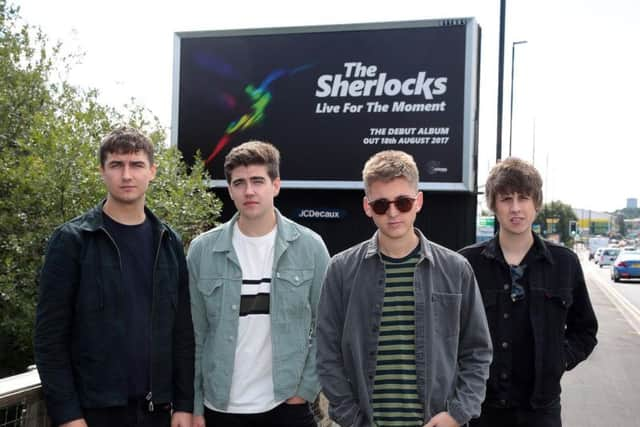 Live For The Moment - The Sherlocks debut album is being promoted with huge Las Vegas style roadside billboards including this one in Penistone Road, Sheffield. Photo: Glenn Ashley.