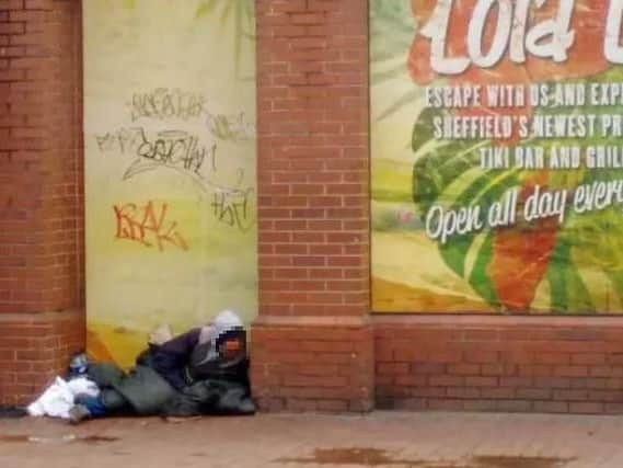 A man on West Street in Sheffield city centre