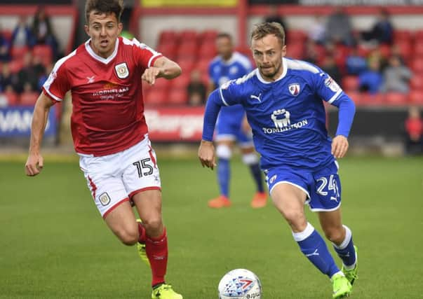 Chesterfield's Andy Kellett breaks past Crewe Alexandra's Ryan Wintle: Picture by Steve Flynn/AHPIX.com.