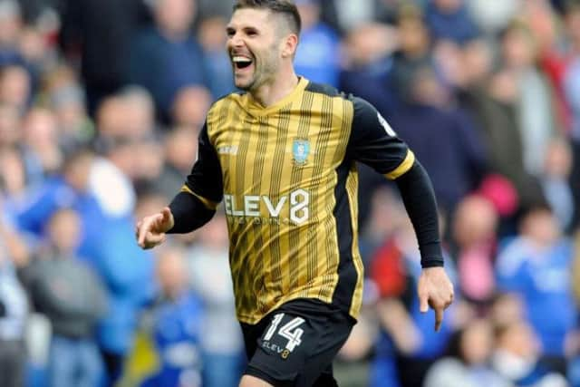 Gary Hooper celebrates after scoring the opening goal for Sheffield Wednesday against Cardiff City