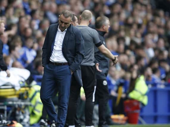 Carlos Carvalhal looks dejected on the sidelines during his side's 4-2 defeat to United