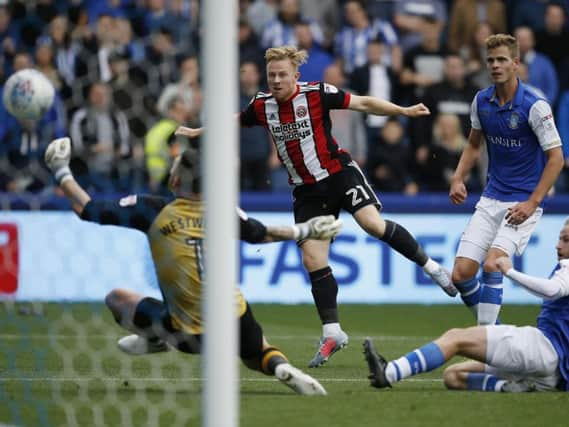 Mark Duffy smashes home against Wednesday