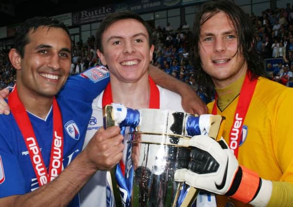 FP89913  CFC players Jack Lester, Gregor Robertson, Tommy Lee with the champions trophy.