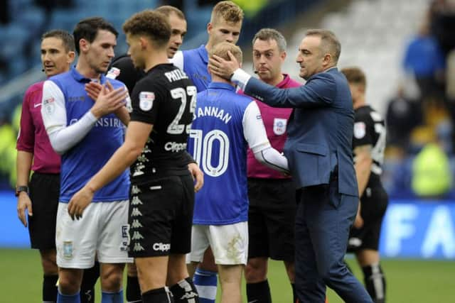 Carlos Carvalhal congratulates Barry Bannan on his performance