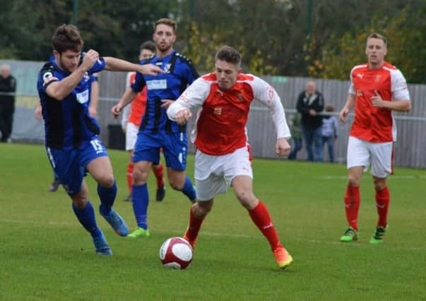 Stocksbridge's Joe Lumsden takes on the Cleethorpes defence   Photo Gillian Handisides