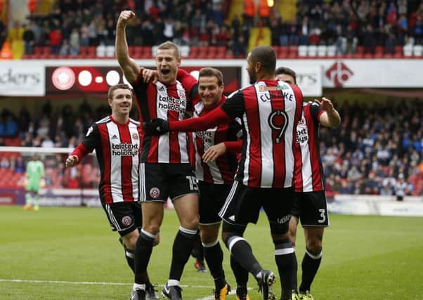 Paul Coutts scored his first goal of the season against Reading: Simon Bellis/Sportimage