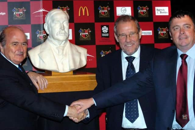 Former FIFA president Sepp Blatter unveils a tribute to the founders of Sheffield FC with Richard Caborn and chairman Richard Tims in 2007.