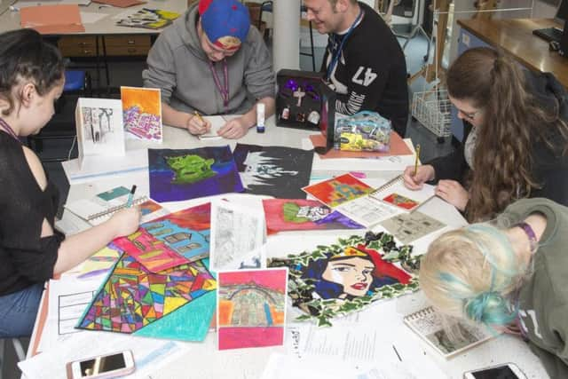 Students prepare for the exhibition