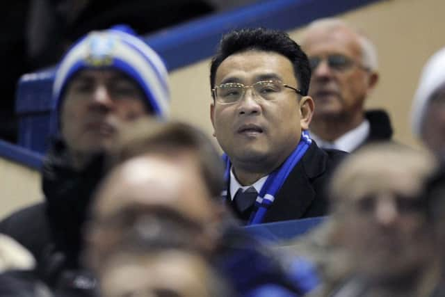 Owls chairman Dejphon Chansiri watches on