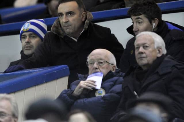 Owls Carlos Carvalhal watches from the stands....Pic Steve Ellis