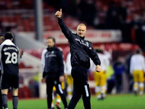 Lee Bullen gives a thumbs up to fans after victory over Nottingham Forest