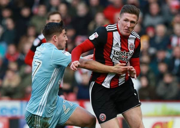 John Lundstram of Sheffield Utd  skips past Lynden Gooch of Sunderland: Simon Bellis/Sportimage