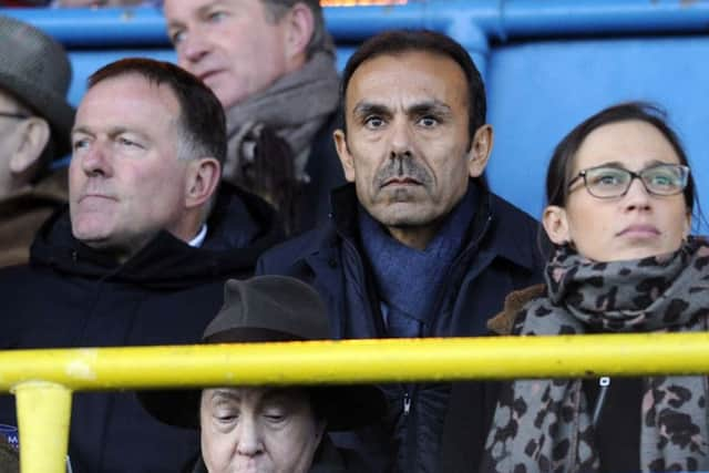 Jos Luhukay watches the Owls at Carlisle