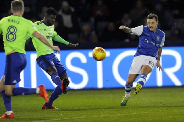 Ross Wallace swings in a cross