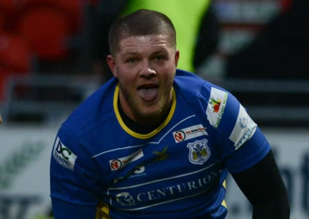 Connor Scott celebrates his try against London. Photo: Rob Terrace