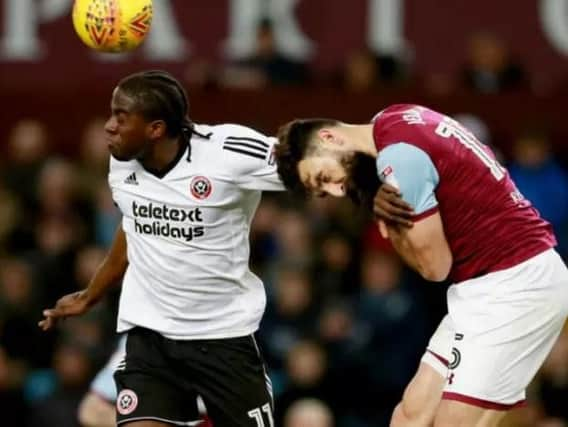 Clayton Donaldson scored both of Sheffield United's goals at Villa Park when the two sides drew 2-2 in DEcember