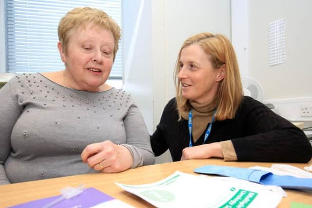 Janet Blair has praised the innovative MS urology clinic at the Royal Hallamshire Hospital which has helped with her condition. The service has led to a decline in the number of hospital admissions resulting from MS-related urinary tract infections. Janet is pictured with Consultant Urological Surgeon Sheila Reid. Picture: Chris Etchells/The Star