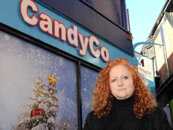 Chrissy Meleady outside the shop that was once used by suffragettes. Picture: Andrew Roe