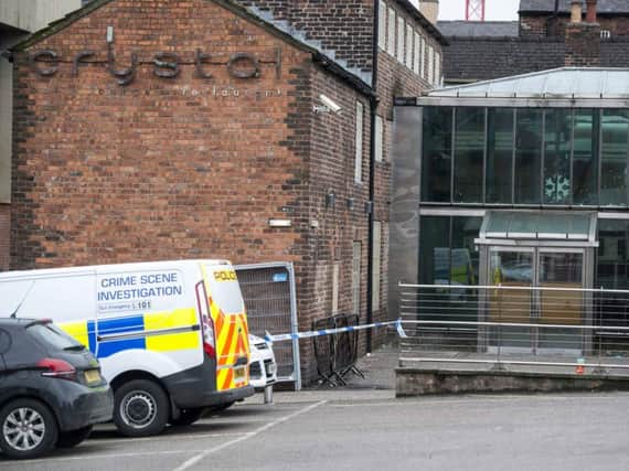 Police outside the bar following the stabbings