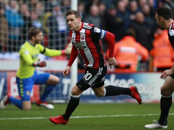 Billy Sharp celebrates his stunning volley