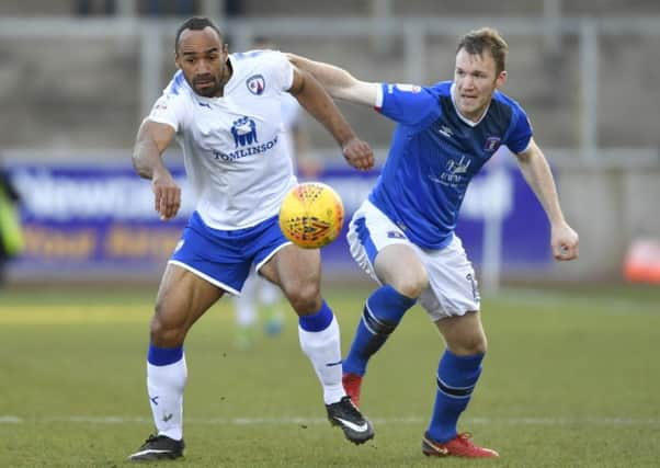 ChesterfieldÃ¢Â¬"s Chris O'Grady competes for the ball with Carlisle UnitedÃ¢Â¬"s Mark Ellis: Picture by Steve Flynn/AHPIX.com, Football: Skybet League One match Carlisle United -V- Chesterfield  at Brunton Park, Carlisle, Cumbria, England on copyright picture Howard Roe 07973 739229