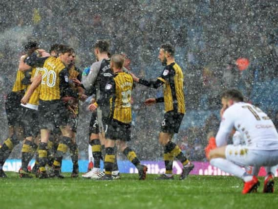 Sheffield Wednesday players celebrate their win over Leeds United at Elland Road