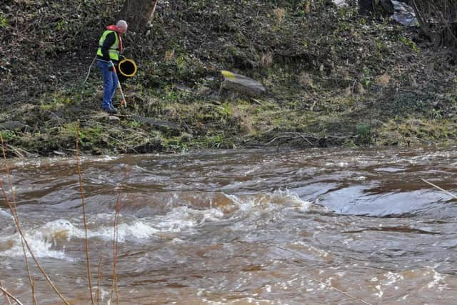 A litter pick and clean up session along the River Don.