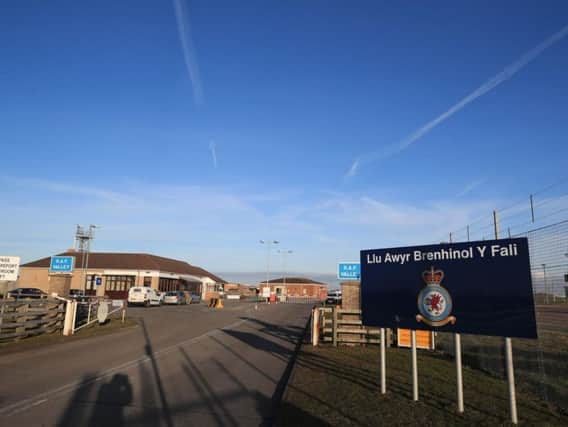 A sign at the entrance to RAF Valley in north Wales, where a Red Arrows jet crashed following an incident. The Ministry of Defence confirmed a Hawk aircraft was involved in the accident at the Anglesey base, where pilots and aircrew are trained. Photo: Peter Byrne/PA Wire