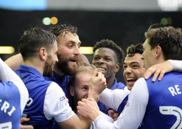 Sheffield Wednesday players celebrate Atdhe Nuhiu's second goal. Steve Ellis