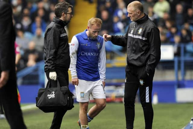 Another Owls injury set back Barry Bannan leaves the field in the first half.....Pic Steve Ellis