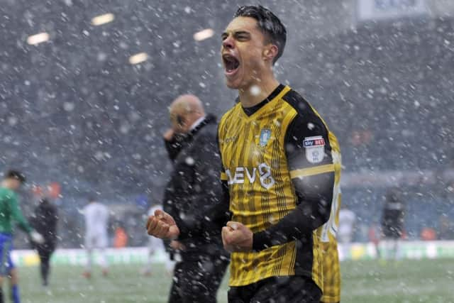 Joey Pelupessy celebrating victory in the snow at Elland Road....Pic Steve Ellis