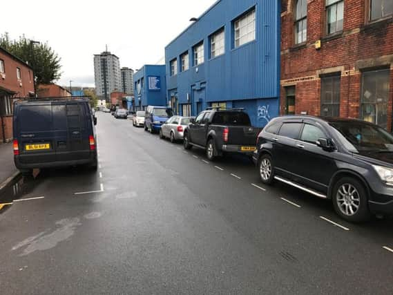 Full parking bays outside Portland Works.