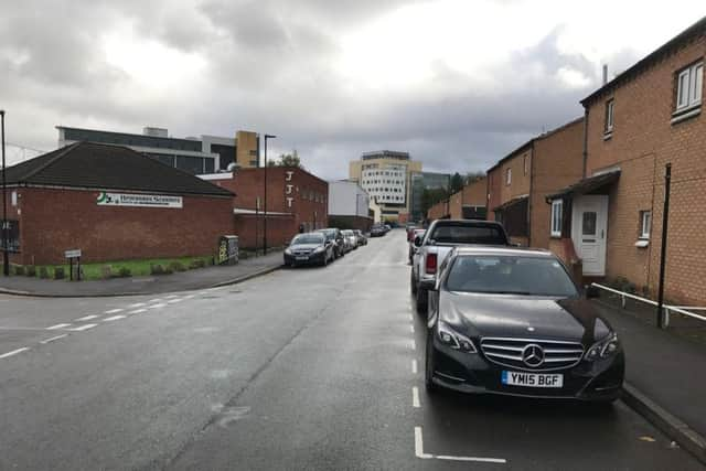 Full parking bays near Portland Works.