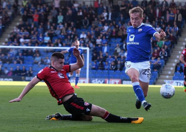 Picture Andrew Roe/AHPIX LTD, Football, EFL Sky Bet League Two, Chesterfield Town v Morecambe, Proact Stadium, 14/10/17, K.O 3pm

Chesterfield's Louis Reed is tackled by Aaron McGowan 

Andrew Roe>>>>>>>07826527594