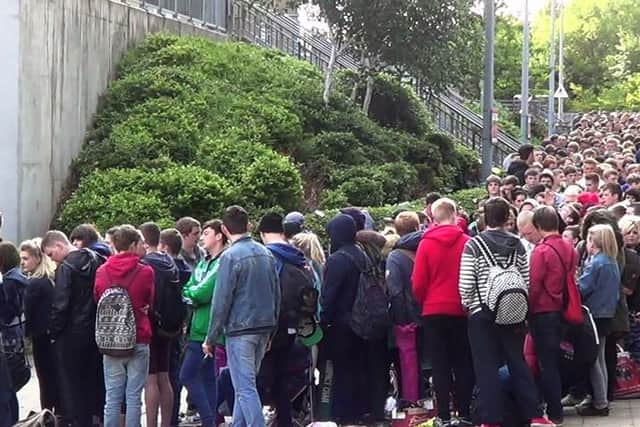 Arctic Monkeys ticket sales scenes at Sheffield Arena in 2013