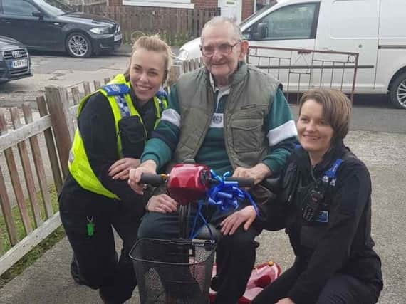 Derek Risdel was presented with a new mobility scooter after his was stolen