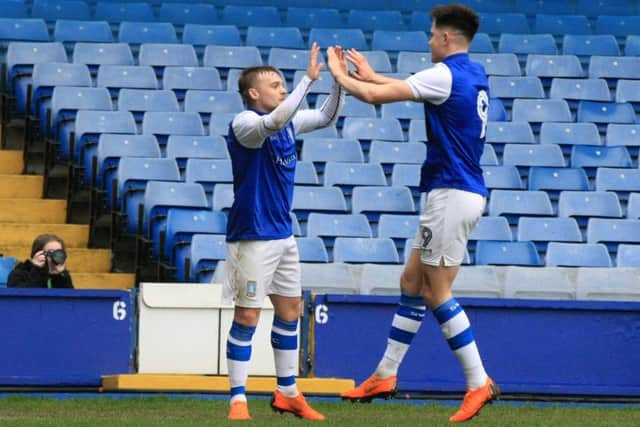 Fraser Preston is congratulated by George Hirst after his Bristol City opener