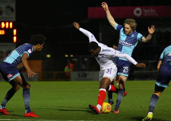 Picture by Gareth Williams/AHPIX.com; Football; Sky Bet League Two; Wycombe Wanderers v Chesterfield FC; 16/12/2017 KO 15.00; Adams Park; copyright picture; Howard Roe/AHPIX.com; Jerome Binnom-Williams is bundled over by Craig Mackail-Smith